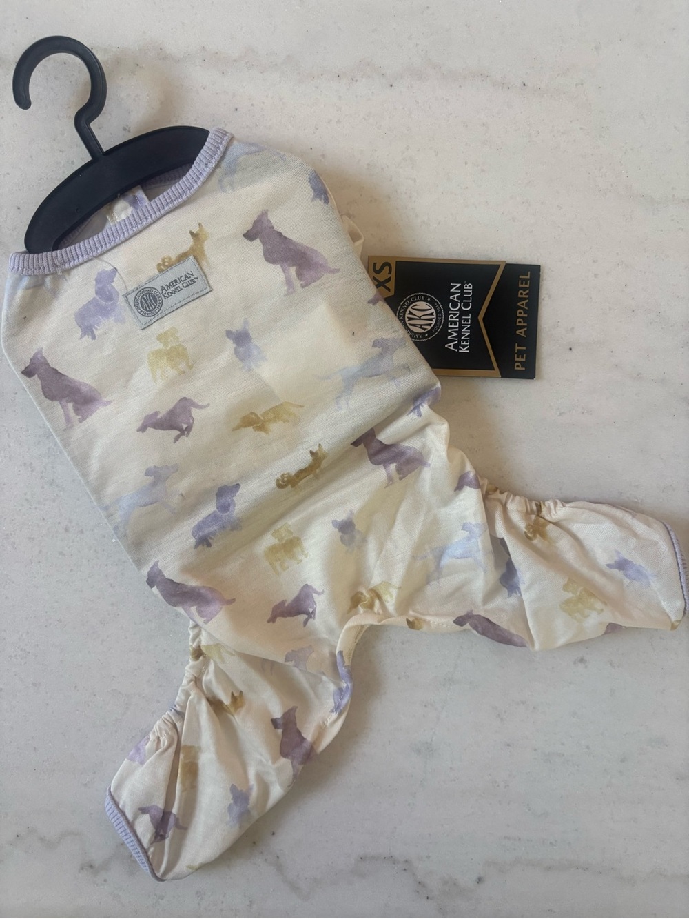American Kennel Club Cream Dog Pajama with Purple & Gold Silhouettes - XS